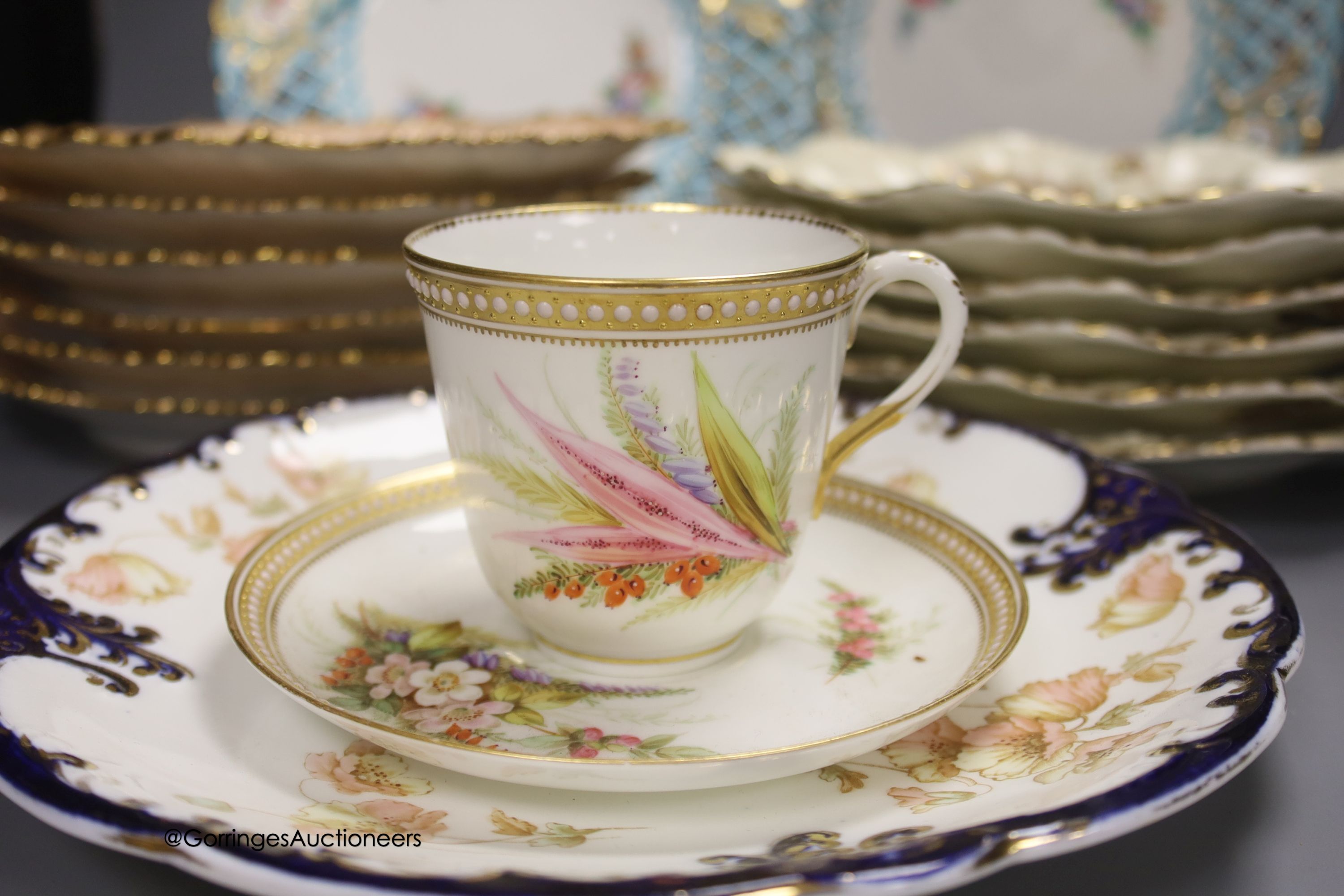 Two sets of six Limoges dessert plates, three English porcelain ribbon plates, an Alfred Pearce Aynsley dessert plate and a Worcester cup and saucer